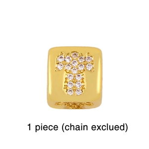 Detailed close-up of 18K gold plated square bead charm with zircon inlay for DIY jewelry