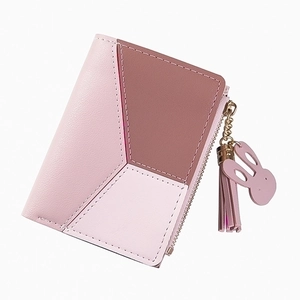 Short patchwork zip wallet for women featuring pastel pink tones and a rabbit ear tassel
