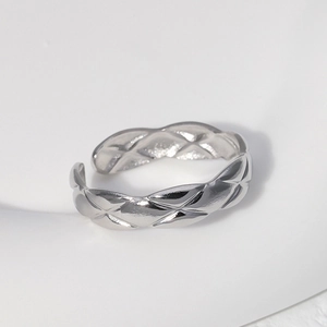 Minimalist silver adjustable stainless steel ring with elegant quilted geometric pattern