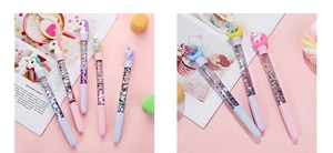 Detail of unicorn liquid glitter pens with colorful flowing sand and cute pastel accents