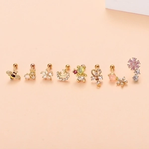 Set of 8 gold stainless steel helix earrings with zircon bee, flower, and moon designs