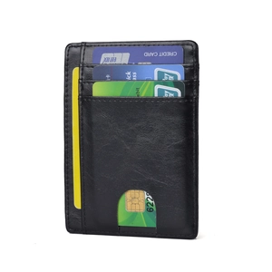 Minimalist black leather RFID card holder with multiple slots and smooth textured finish