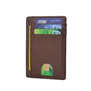 Detail view of coffee Saffiano leather card holder with RFID slots and U-shaped window