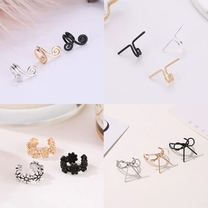 Minimalistische geometrische Ohrklemmen in Gold, Silber und Schwarz mit Blumen und Schleifen