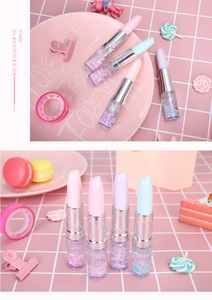 Close-up of creative lipstick gel pens with colorful liquid glitter quicksand detail