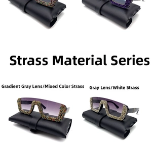 Flat lay of retro oversized half-frame sunglasses with colorful rhinestones and leather cases