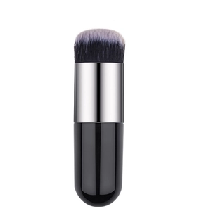 Detail of soft black and grey gradient bristles on a professional kabuki foundation brush