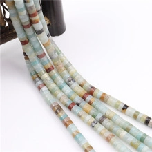 Macro shot of colorful cylindrical natural stone spacer beads for DIY jewelry making