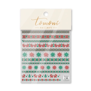 Close-up of embossed 5D Christmas nail stickers with snowflake and reindeer patterns