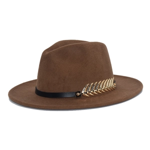 Detail view of brown wool fedora hat featuring black leather band and gold metal feather
