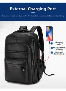 Detail showing side USB charging port on the black PU leather vintage backpack