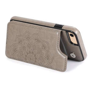 Detail of grey mandala embossed leather flip case for iPhone with secure magnetic closure