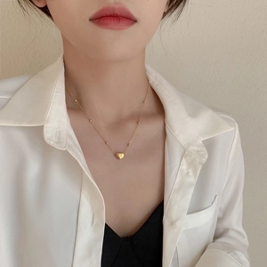 Elegant 18K gold-plated heart pendant on a delicate beaded chain necklace for women