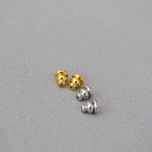 Golden and silver brass bullet clutch earring backs with silicone pads for DIY jewelry
