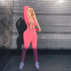 Full view of a pink long sleeve skin-tight jumpsuit showing elastic slim fit design