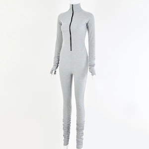 Detail of the soft elastic grey long sleeve bodysuit with front zipper closure