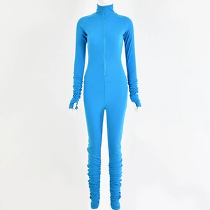 Detail of blue ribbed long sleeve jumpsuit featuring front zipper and ruched sleeve cuffs