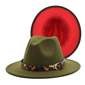 Detail of army green wool fedora hat with red brim lining and leopard print belt strap