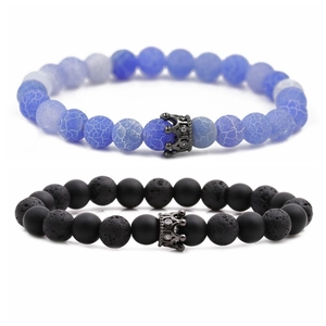 Detail of 8mm lava rock and blue crackle agate bead bracelets with crown charms