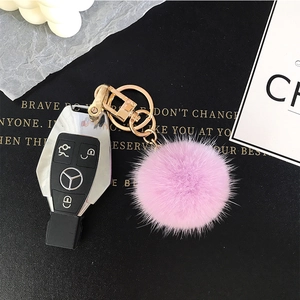 Plush purple mink fur pompom keychain with golden metal spring ring for handbags