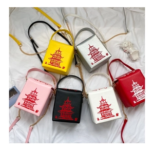 Top view of creative PU leather takeaway box bags with gold chains in six vibrant colors