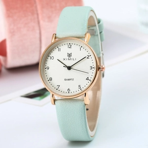 Minimalist quartz watch for women with mint green leather strap and rose gold round case