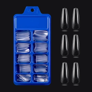 Clear coffin press on nail set in a blue storage box with ten different sizes