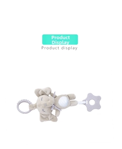 Detail of elephant plush baby toy with purple star-shaped teether and geometric patterns