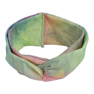Detailed view of bohemian tie-dye elastic headband with soft macaque colors and knot