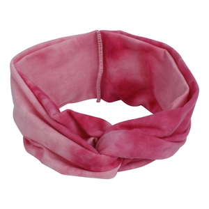 Detail of twisted knot headband featuring pink and magenta tie-dye textured fabric