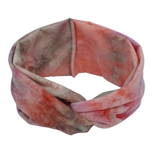 Close-up of bohemian tie-dye elastic headband showing soft fabric texture and twist detail