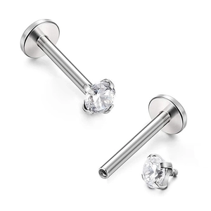 G23 titanium flat back labret stud with a clear four-prong round cubic zirconia gem