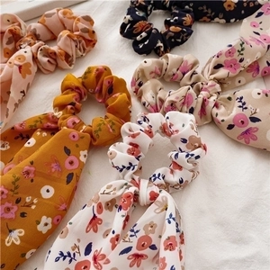 Set of floral chiffon scrunchies with long ribbons in assorted pastel colors for ponytails
