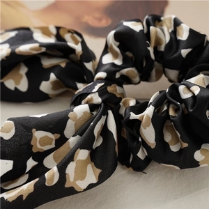 Leopard print satin scrunchie with large bow knot, stylish animal pattern hair tie