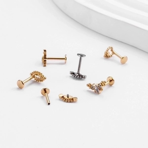 G23 Titanium labret stud set in gold and silver finish with zircon heart and crown designs