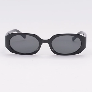 Retro polygon narrow frame sunglasses with dark grey lenses for casual streetwear and driving