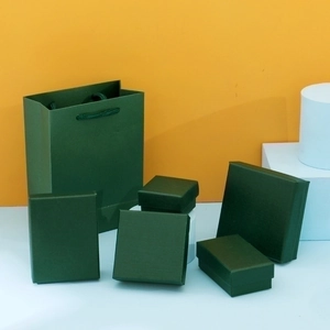 Dark green jewelry gift box set with paper bag and boxes for rings and necklaces