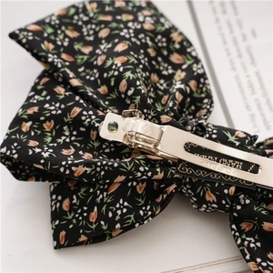 Three-layer floral bow hair clip with silver spring metal fastener and Paris handmade stamp