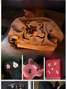Detailed embroidery patches featuring colorful cartoon characters applied to denim and bags