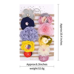 Detail of 10-piece elastic flower headbands set with soft lace and pearl accents