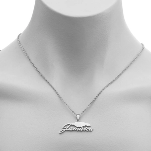 Detail of silver Jamaica map pendant with cursive text on a mannequin neck display