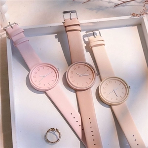 Minimalist quartz watches with matte dials and PU leather straps in pastel colors