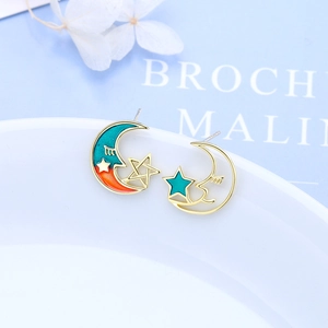 Asymmetric moon and star stud earrings with gradient enamel and gold plated finish
