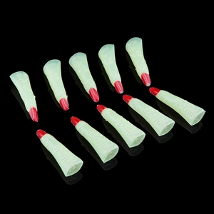 Glow in the dark zombie witch finger nails for Halloween costume in fluorescent green