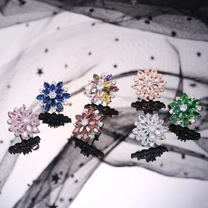 Detailed view of luxury sunflower stud earrings with double-layer cubic zirconia in seven colors