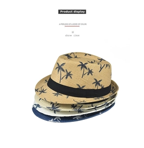 Multiple colors of linen straw fedoras featuring coconut tree prints and black bands