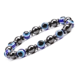 Detailed macro view of 8mm magnetic hematite beads and protective evil eye charms