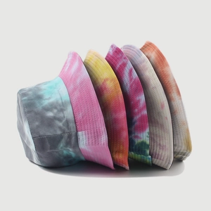 Colorful tie-dye bucket hats for men and women shown in multiple patterns and vibrant colors