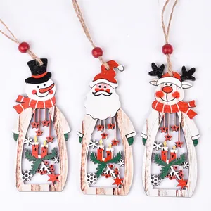 Laser-cut wooden Christmas ornaments with Santa Claus and Reindeer hollow designs