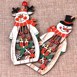 Laser-cut wooden Christmas ornaments with hollow snowman and reindeer candle designs